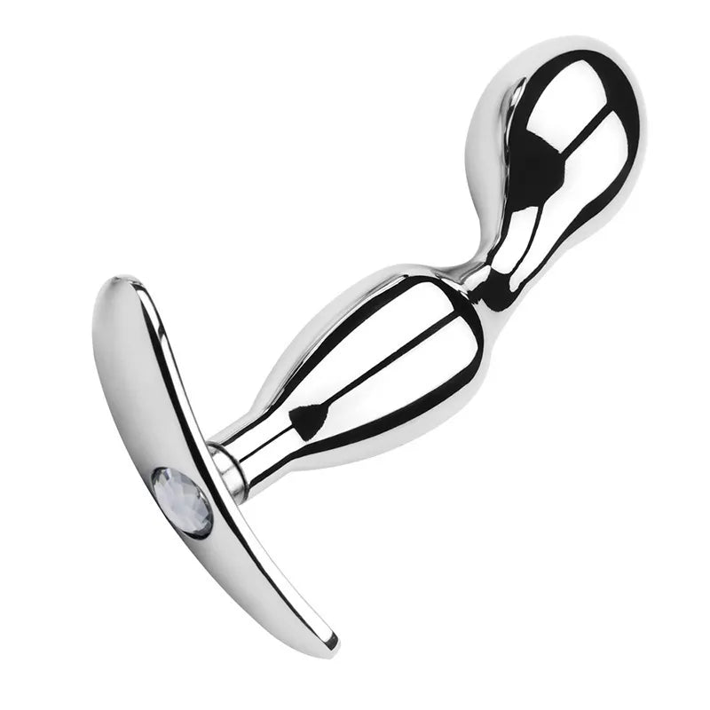 Pair of silver stainless steel butt plugs with smooth tapered shape and jeweled bases