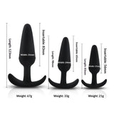 Collection of 5-inch black silicone insertables with stable, ergonomic bases