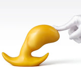 8-inch flexible yellow silicone toy featuring an ergonomic curved design
