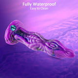 Close-up shot of a textured purple silicone pleasure product with an intricate, otherworldly aesthetic and an embedded eye detail on the stand