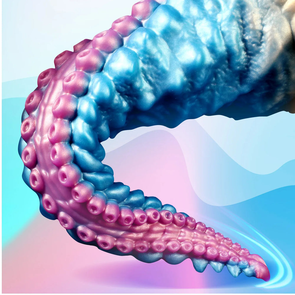 Blue and pink tentacle dildo with spiral ridges and suction cup details