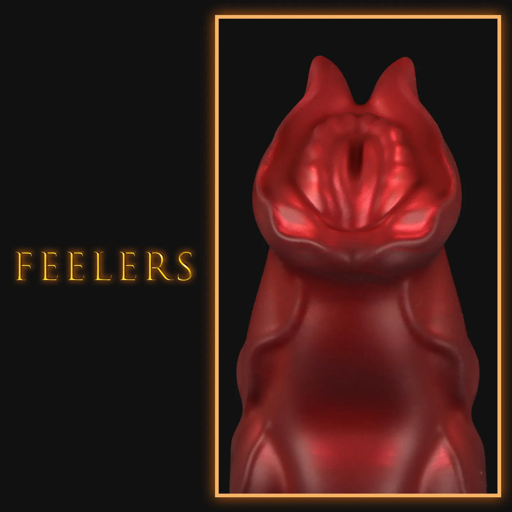 Sculpted red silicone dragon probe designed with a unique tapered silhouette