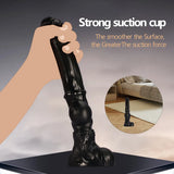 This 14-inch black PVC dildo showcases a structured knot and a smooth finish, designed for a substantial and realistic experience