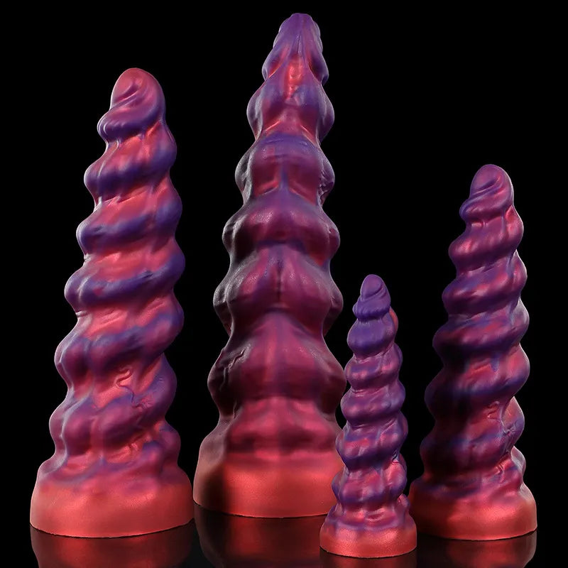 A studio portrait of a bi-color iridescent fantasy dildo with a widening spiral ribbed texture and flared base