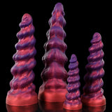 A studio portrait of a bi-color iridescent fantasy dildo with a widening spiral ribbed texture and flared base