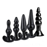 Silicone butt plug set with black training beads and assorted plug designs