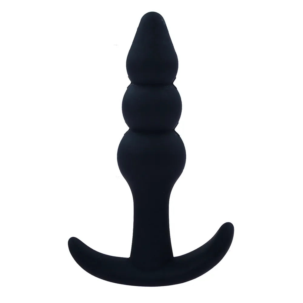 Small teardrop and ribbed silicone butt plugs from the 4-piece kit ideal for beginner training