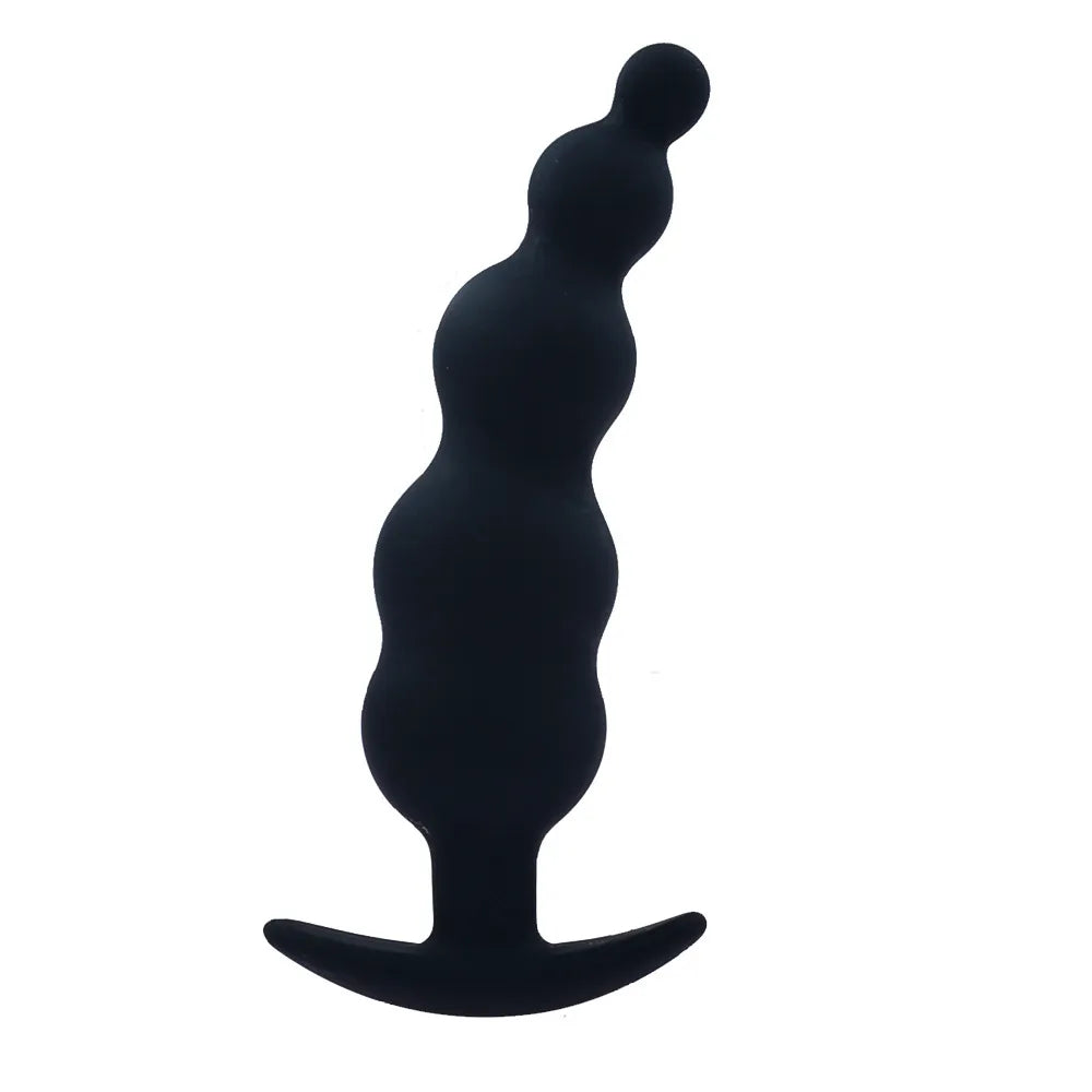 Close-up of the secure anchor T-bar bases on the silicone anal training kit for safe wear