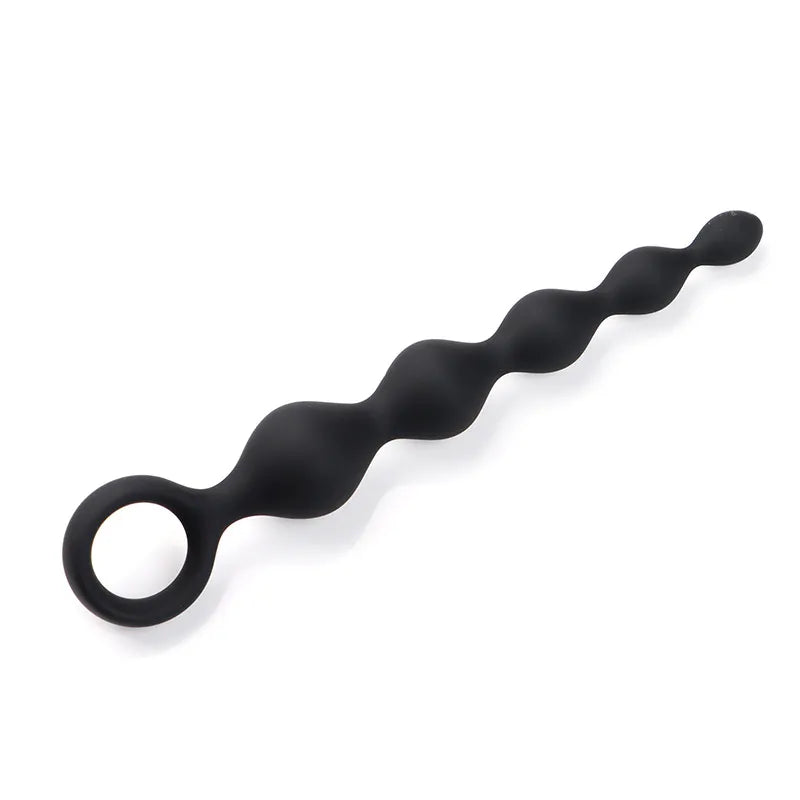 Side profile of the progressive black silicone anal plug showing graduated beads for training