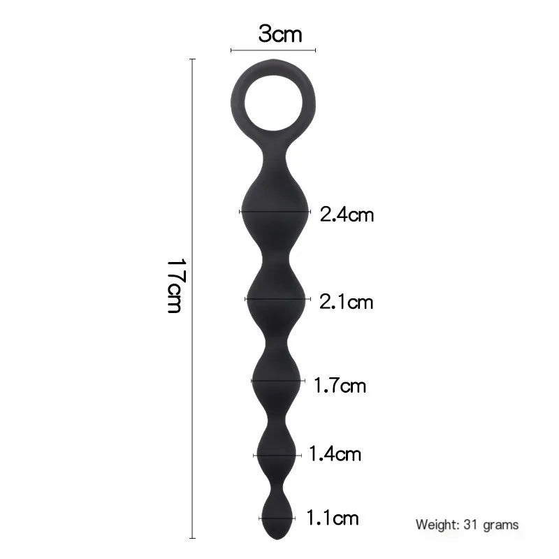 Tapered smooth tip of the 7-inch beaded anal toy designed for easy and comfortable insertion