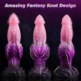 Close-up of a 7-inch tri-color creature phallus with an organic segmented shaft and a sturdy flared base