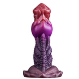 A 7-inch monster dildo made of body-safe silicone featuring a red-to-purple ombre color gradient