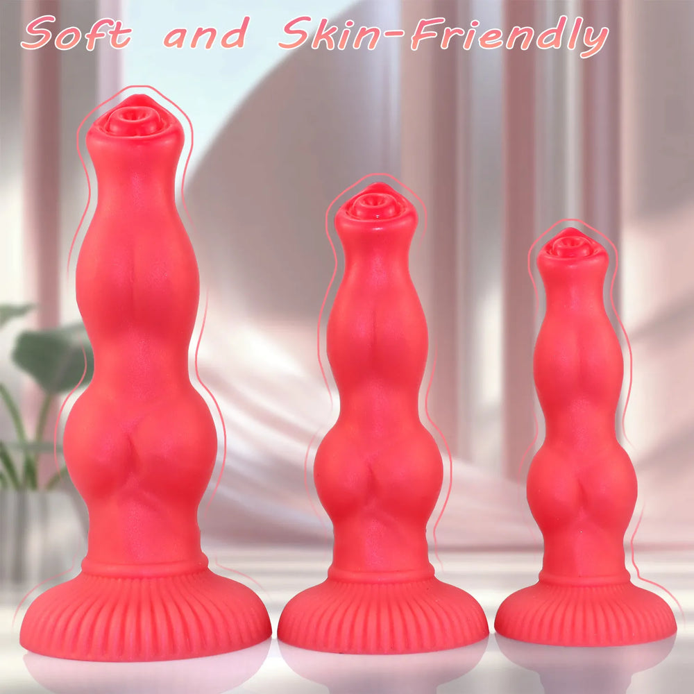 Full-length view of a 9-inch red silicone pleasure toy, highlighting its smooth finish and distinct, anatomically-inspired knot structure