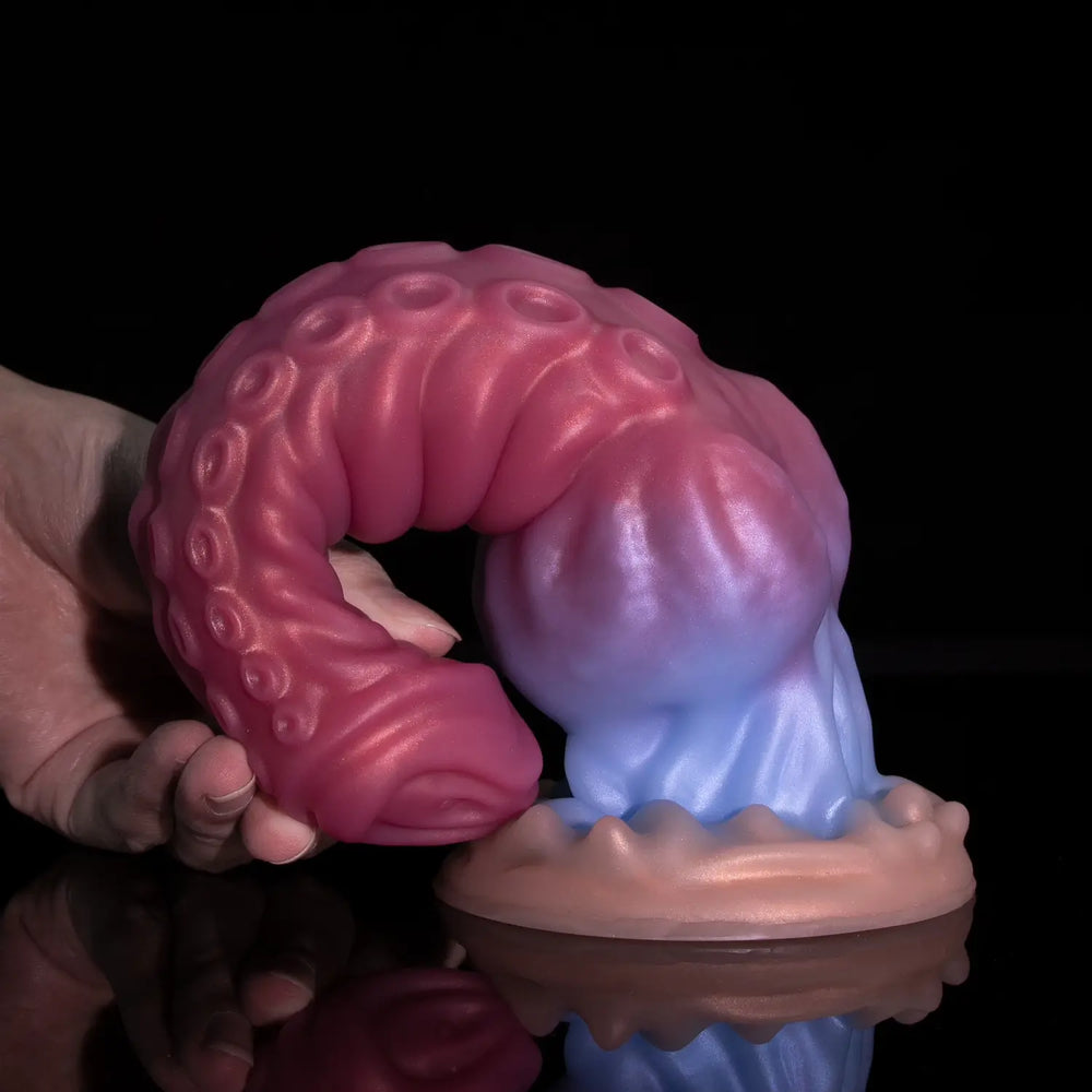 Soft silicone fantasy toy showcasing a beautiful pearlescent pink to blue color transition