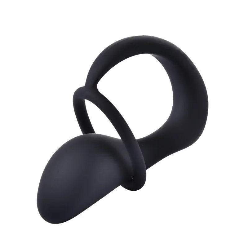 A clean studio photo of two flexible black tools, possibly for self-massage or acupressure