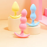 Assorted pastel silicone plugs with different textures for varied sensations